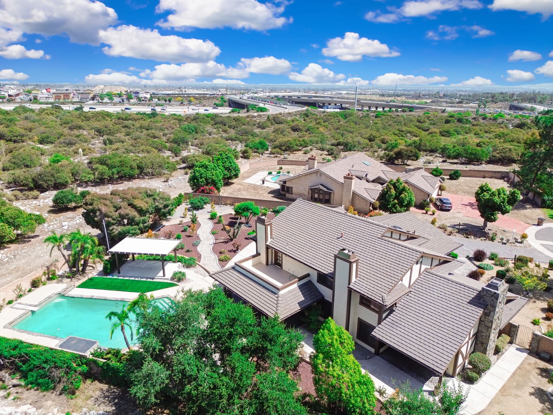 High aerial view over Claremont and the surrounding valley