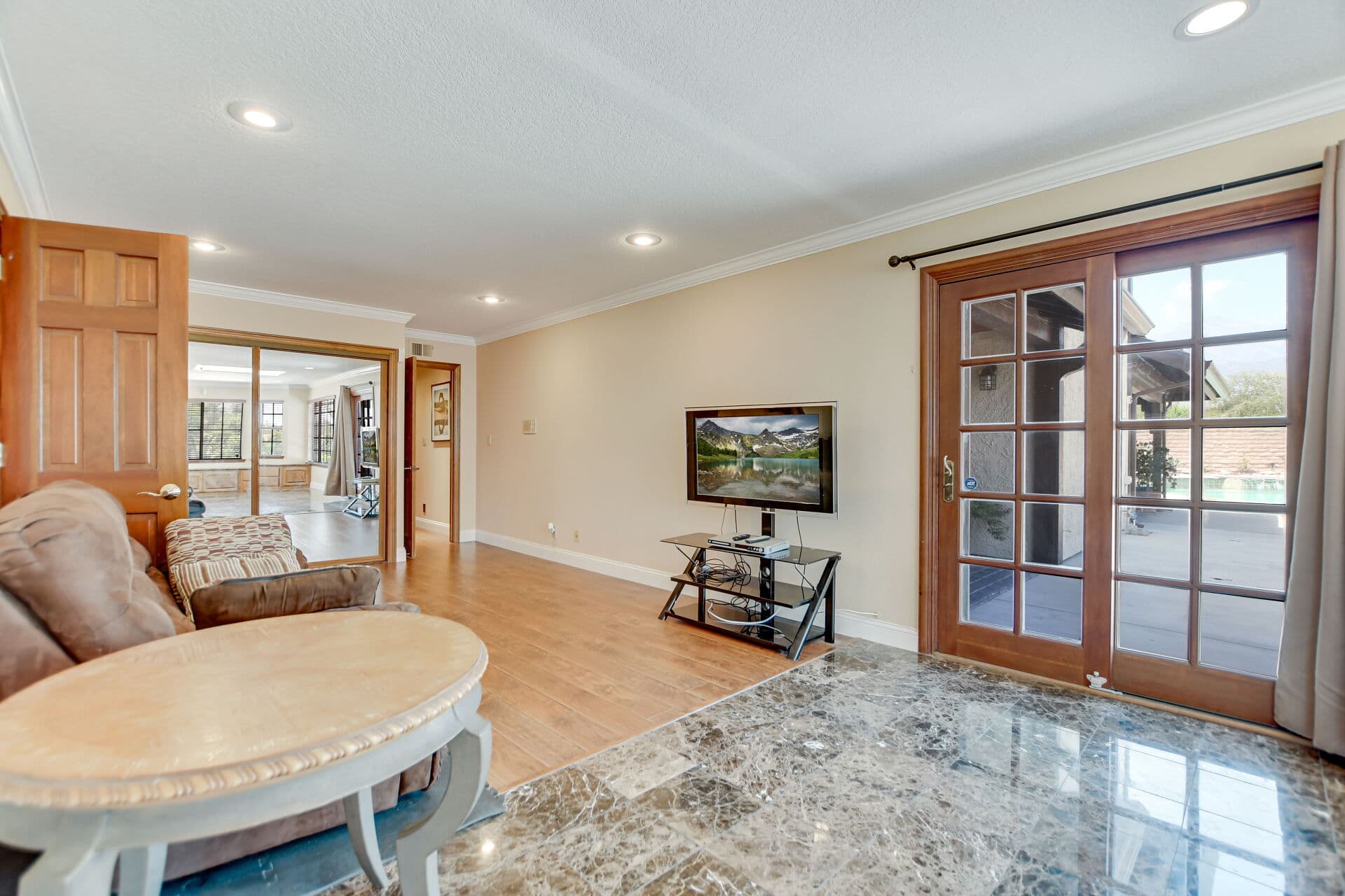 Family room with a French slider in a Claremont home