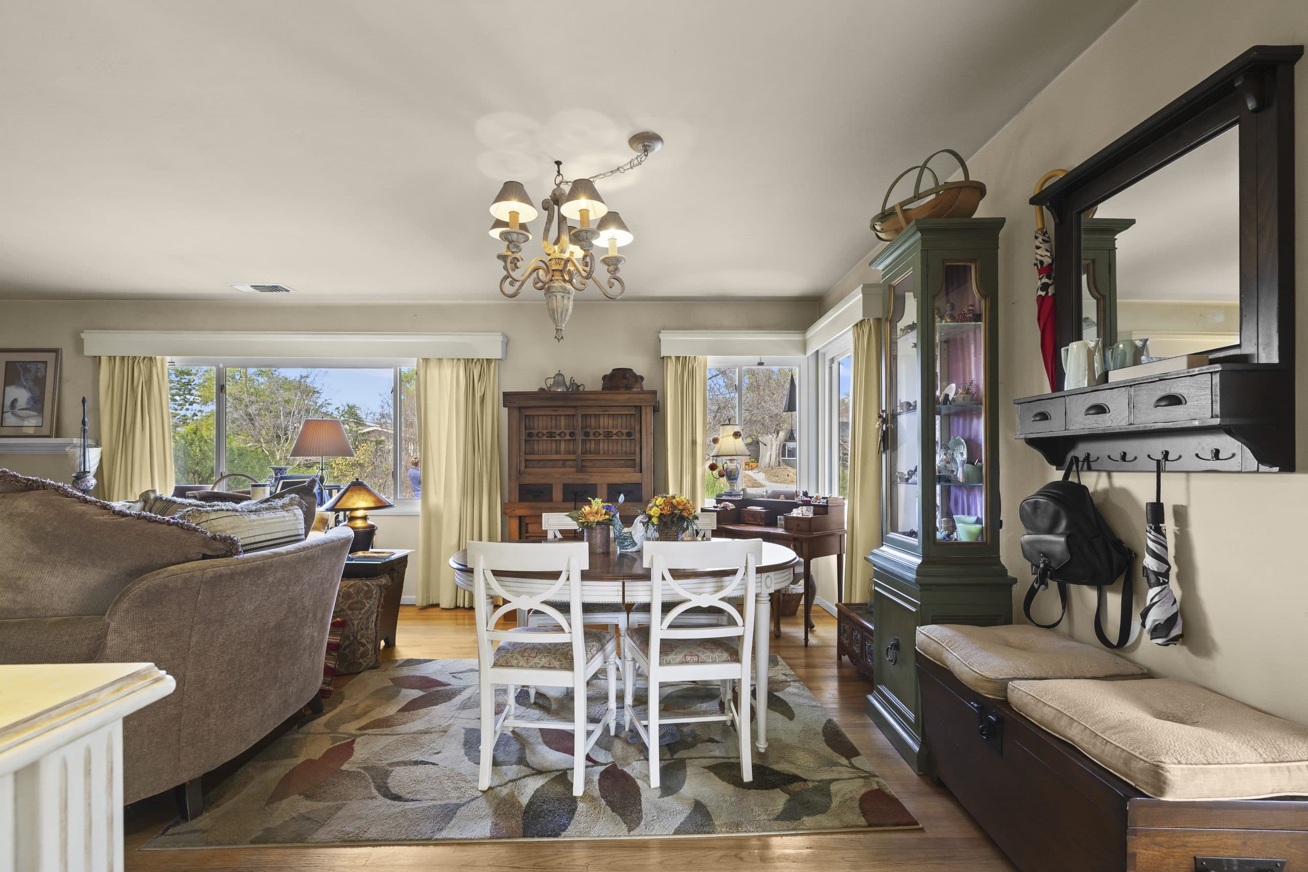 Furnished Claremont dining room interior with natural light