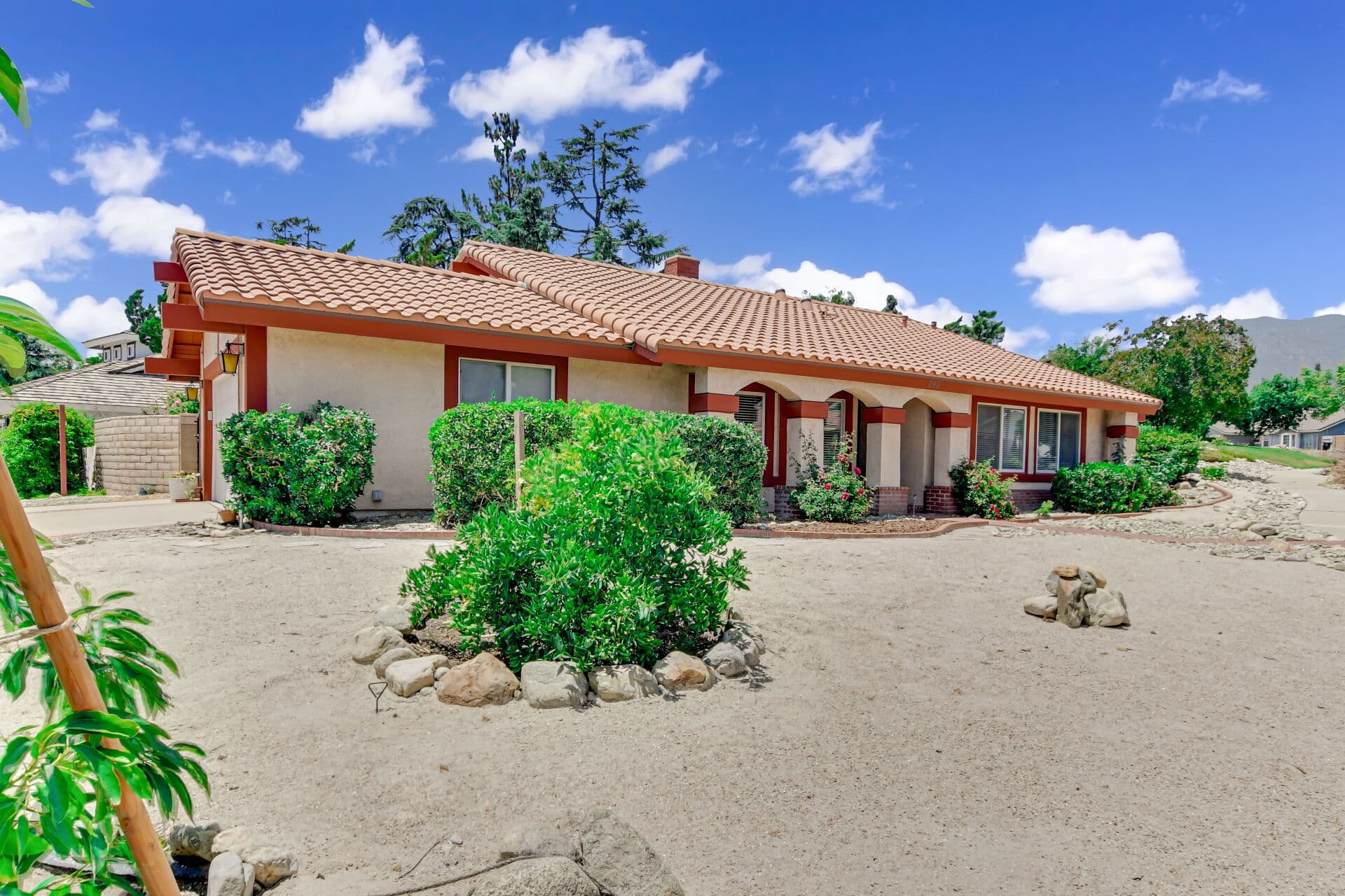 Well-kept single-story Spanish-style Claremont home with arched porch