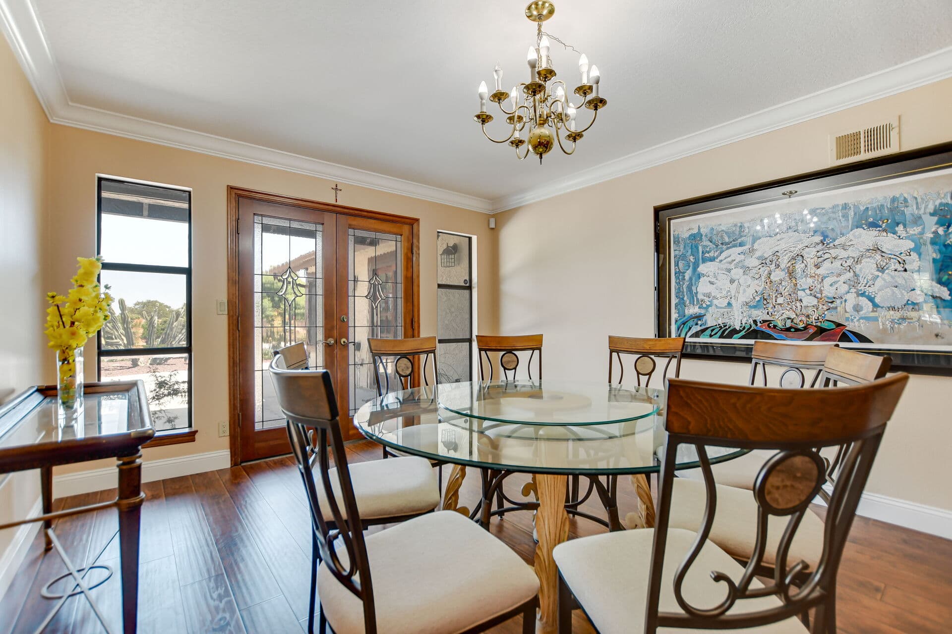 Leaded-glass double entry doors seen from the dining room of a Claremont home