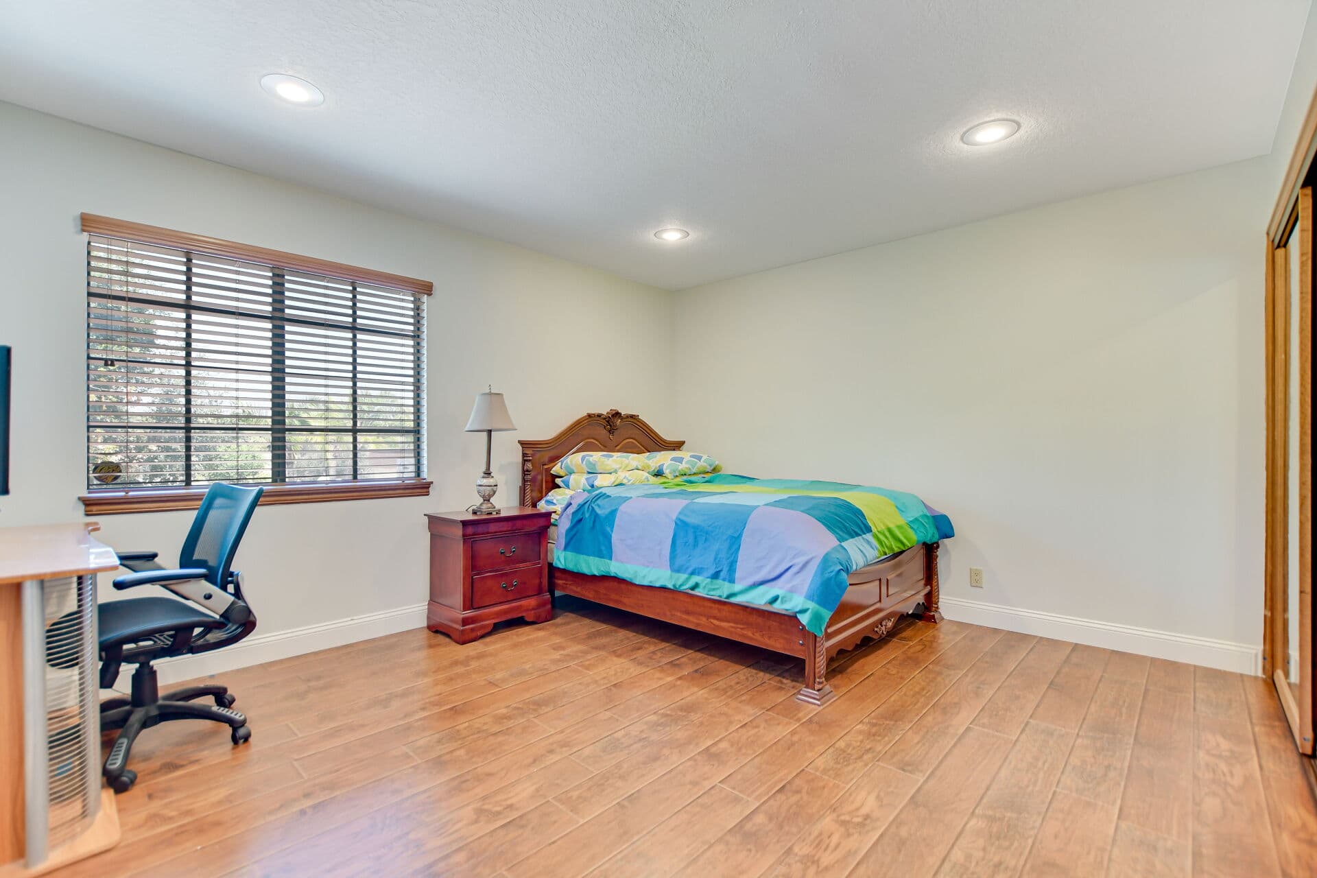 Bedroom with natural light in a Claremont home
