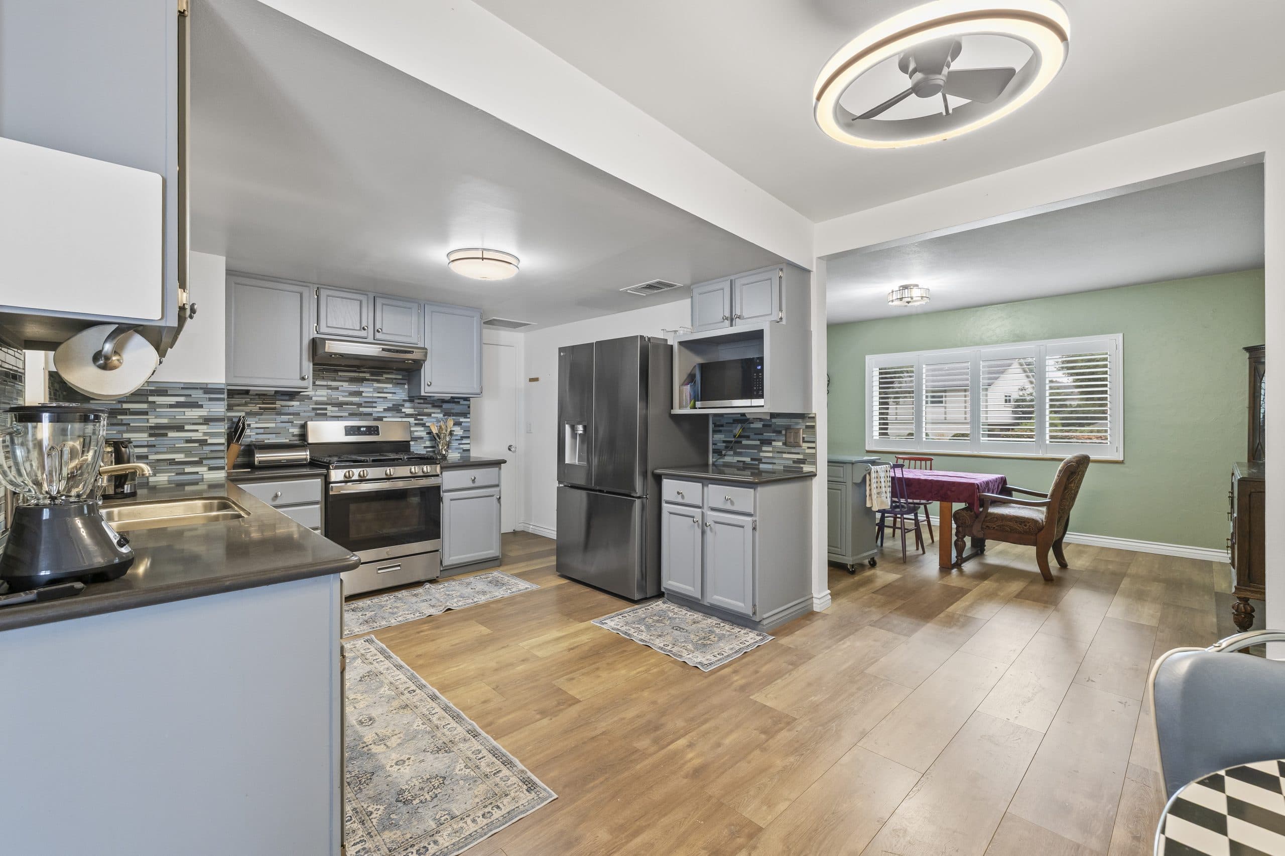 Compact kitchen with open shelving in a Claremont home