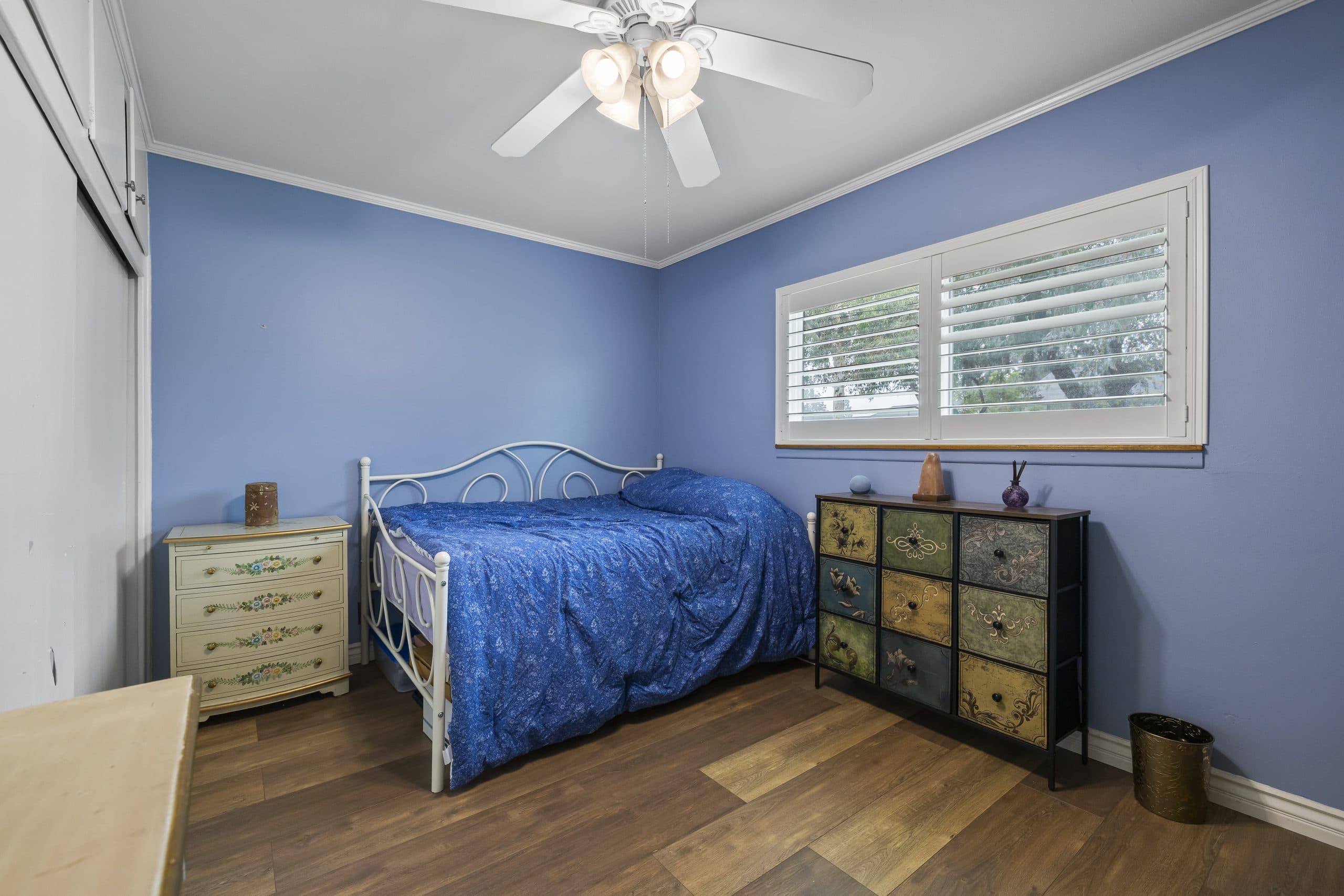 Simple periwinkle bedroom in a Claremont family home