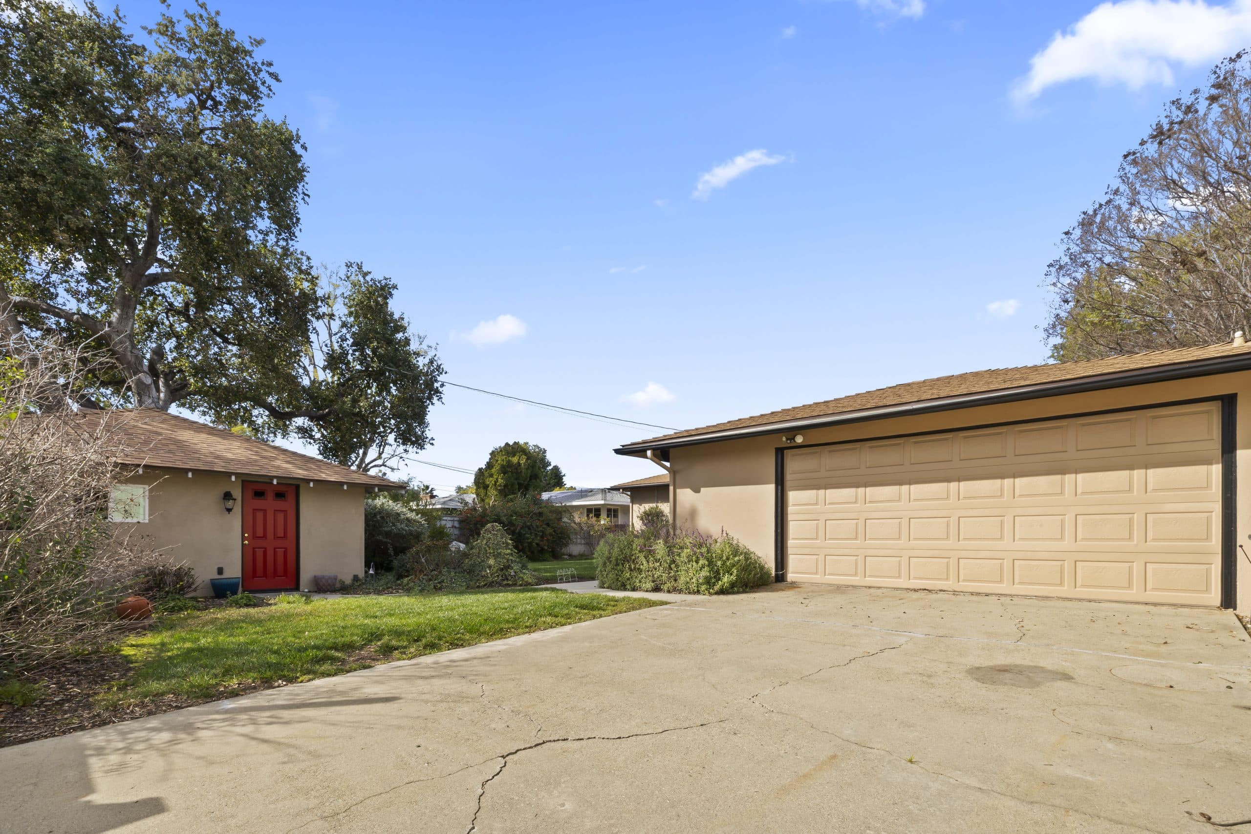 Claremont single-story home with attached garage and driveway