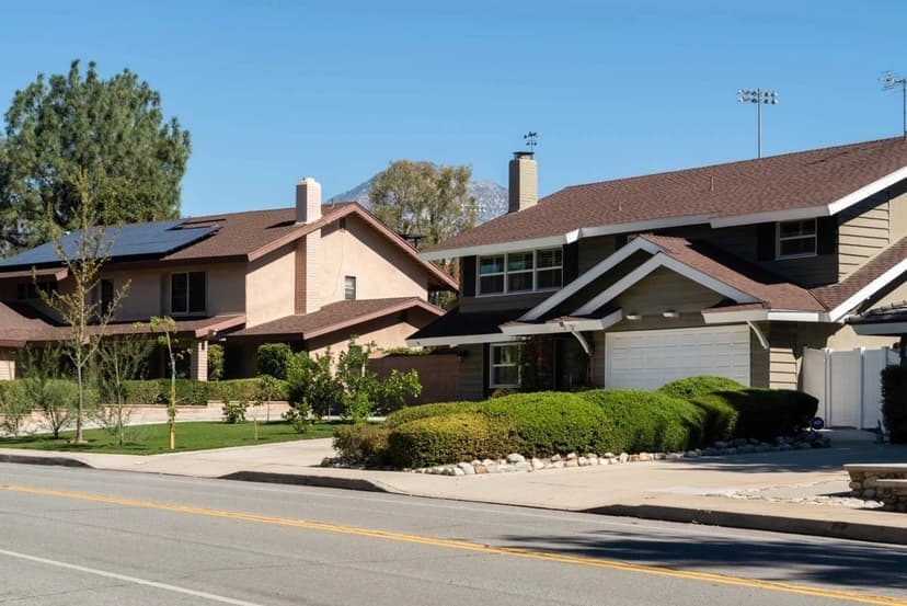 Residential Claremont street with mid-century homes and Mt. Baldy behind
